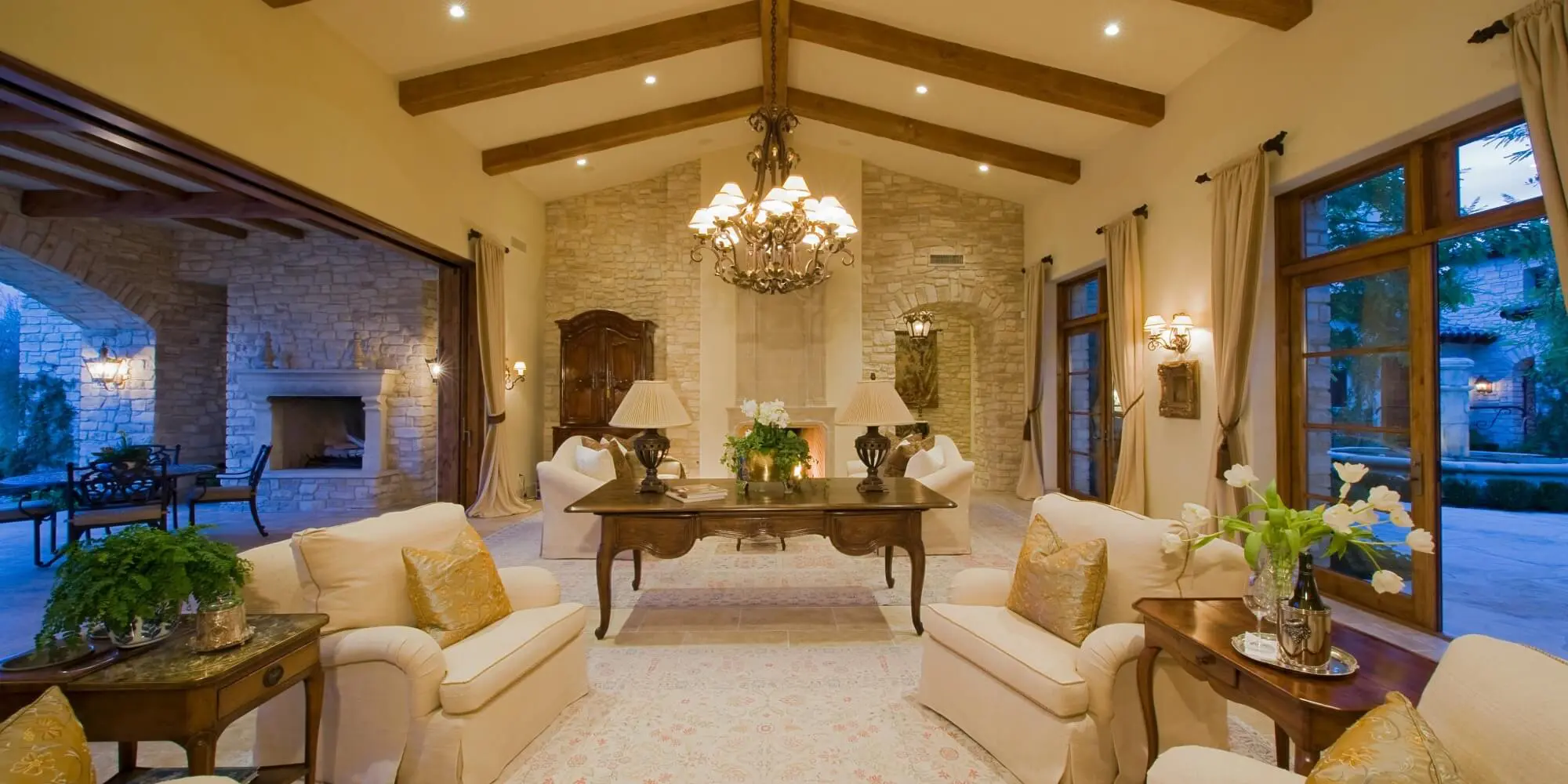 Stone fireplace and wood beams, contact Emerald Painting in Southern Pines, NC