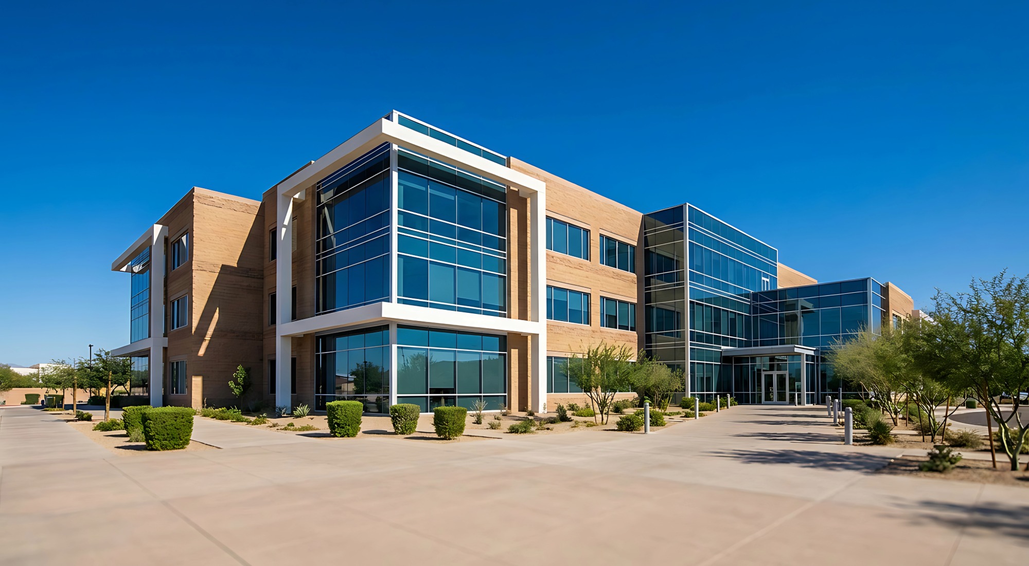 Tan office building, commercial exterior painting in Southern Pines, NC
